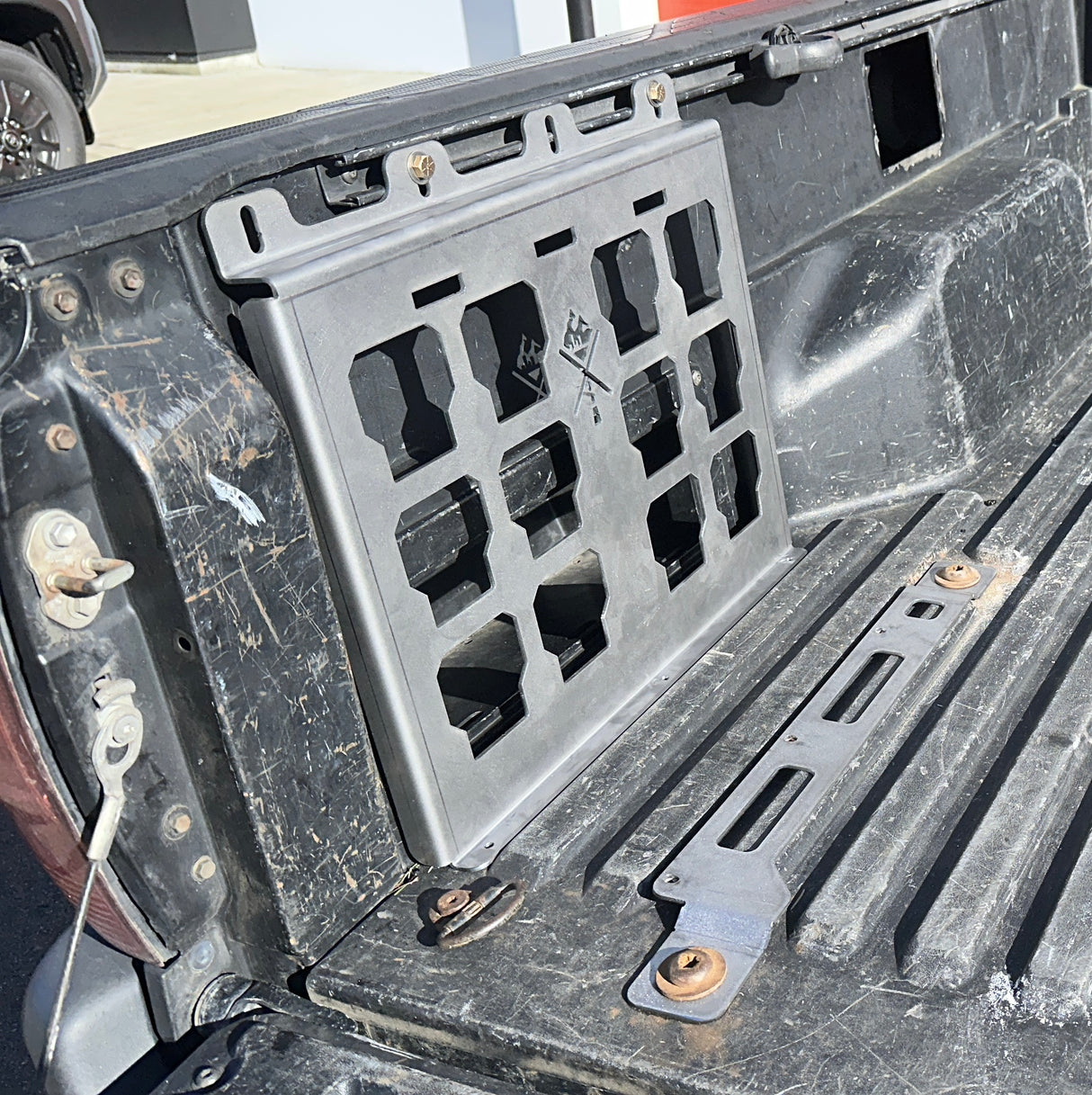 cargo mount on the inside bed of a truck.