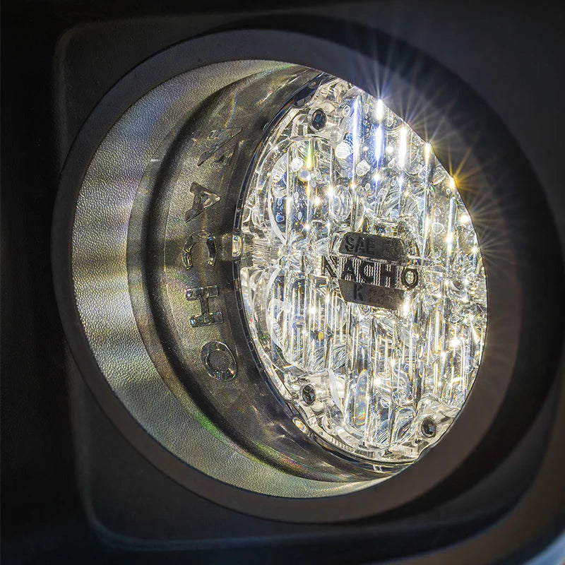 Close-up of a Nacho Fog light fixture on a dark background