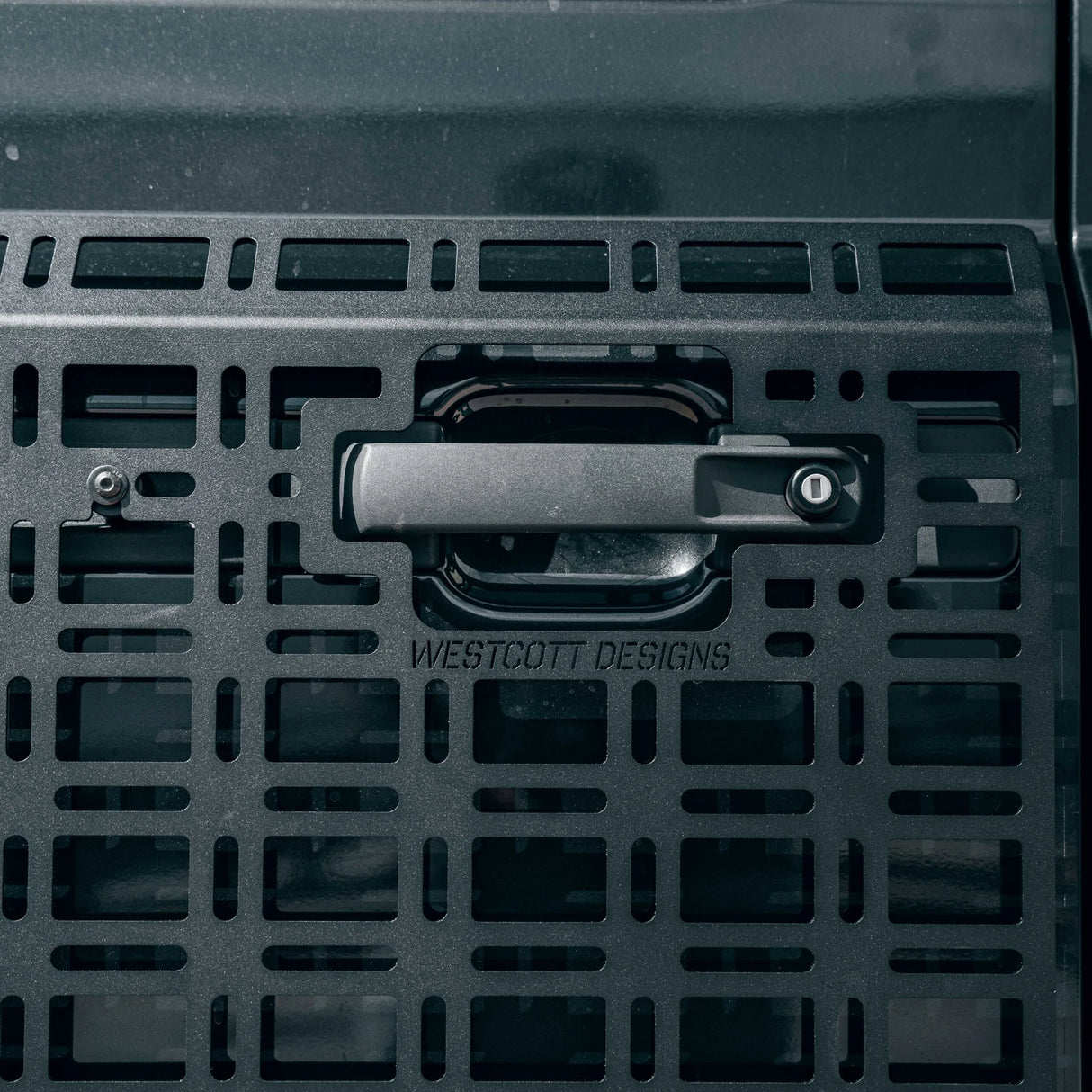Black storage bin with a handle and 'Westcott Designs' branding.