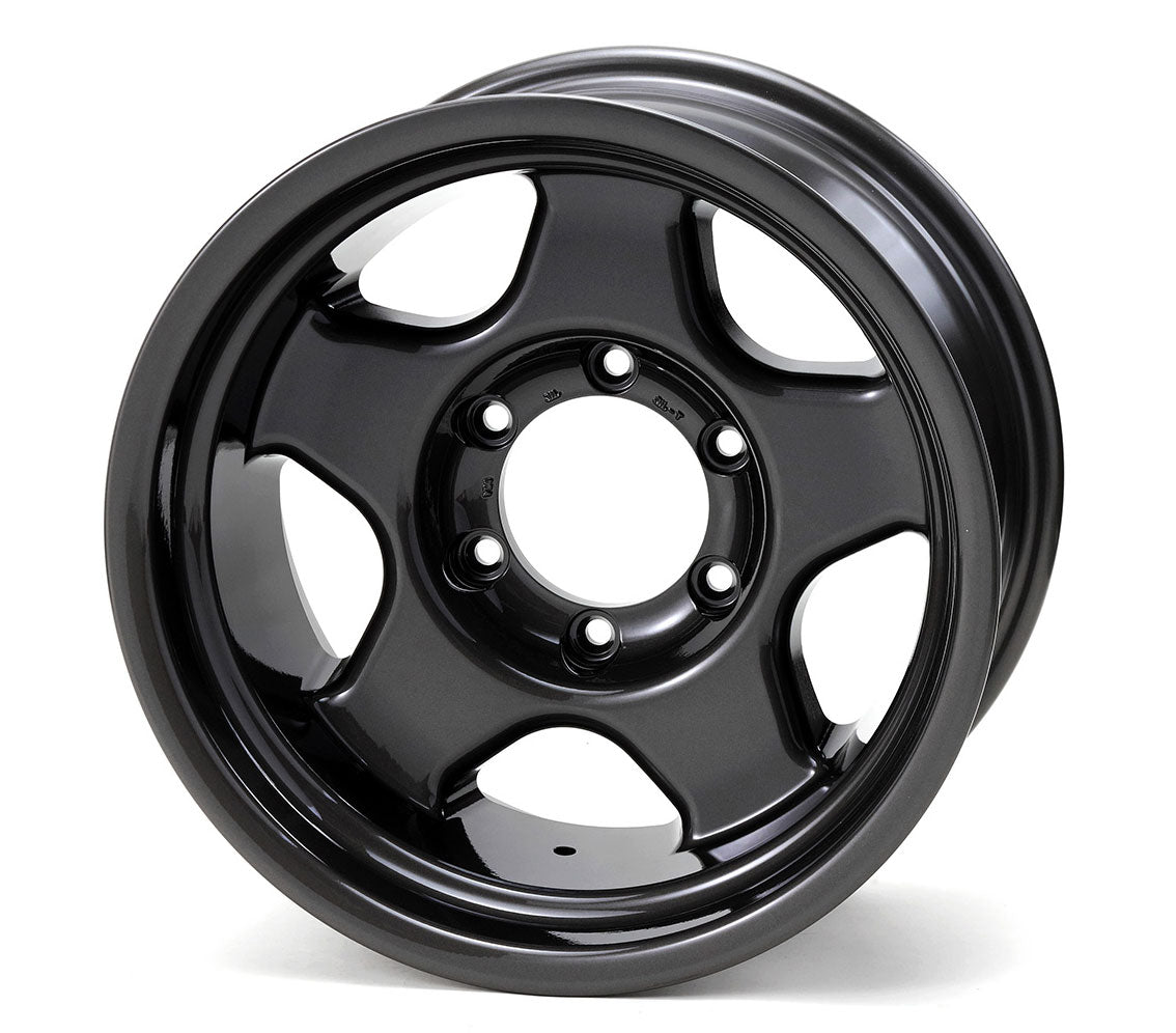 Black alloy wheel on a white background