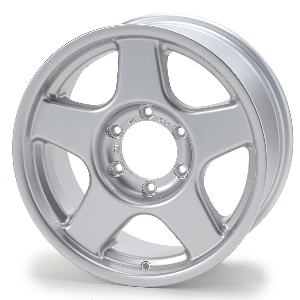Silver alloy wheel on a white background