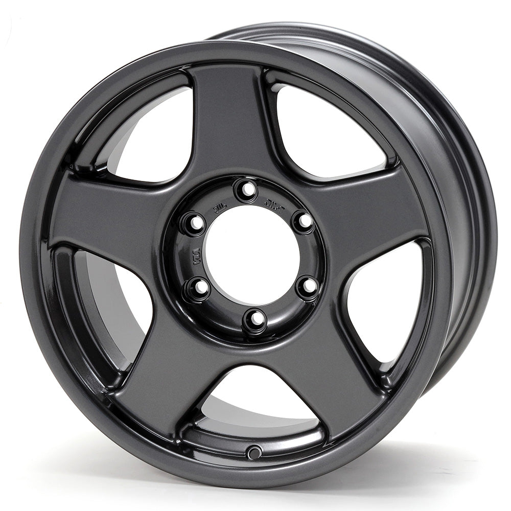 Black alloy wheel on a white background