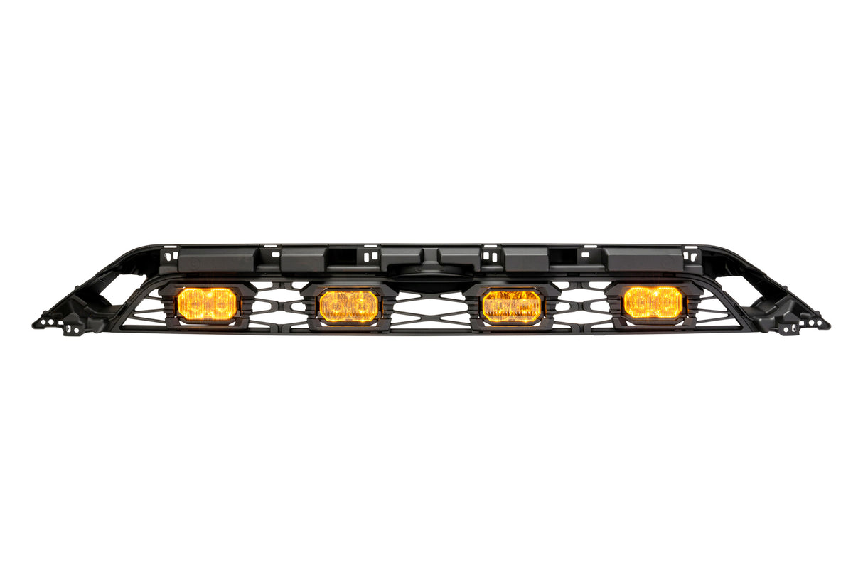 Black metal light bar with four yellow lights on a white background