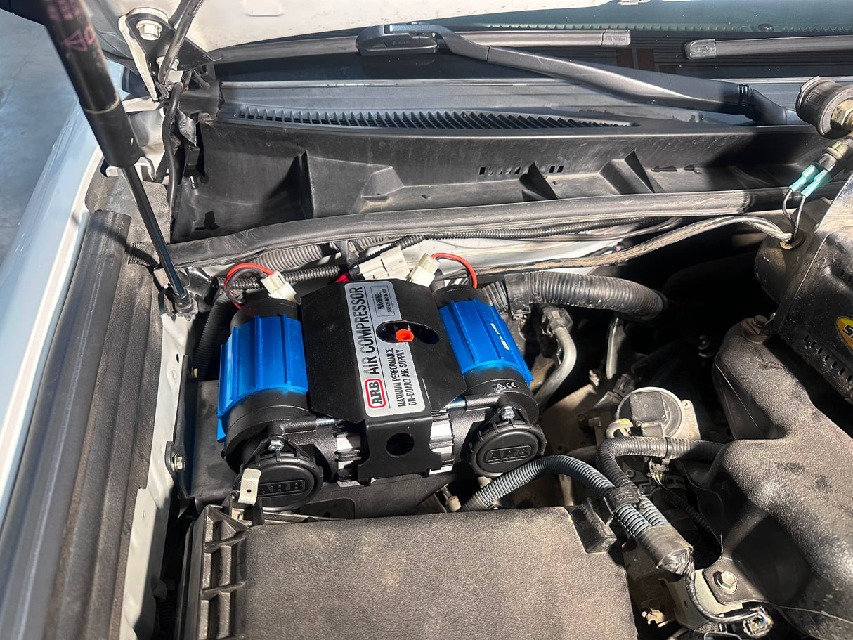 air compressor inside of a truck engine