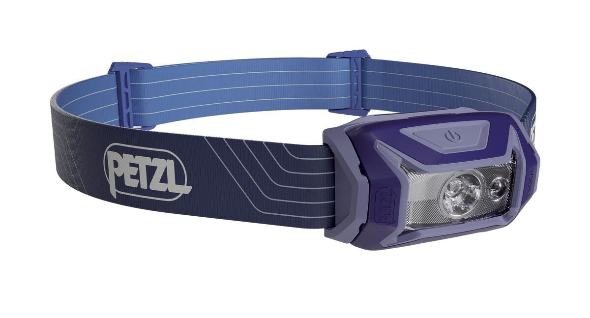 Petzl Tikka Headlamp with purple and gray color scheme, featuring a single white light and a headband with the Petzl logo.
