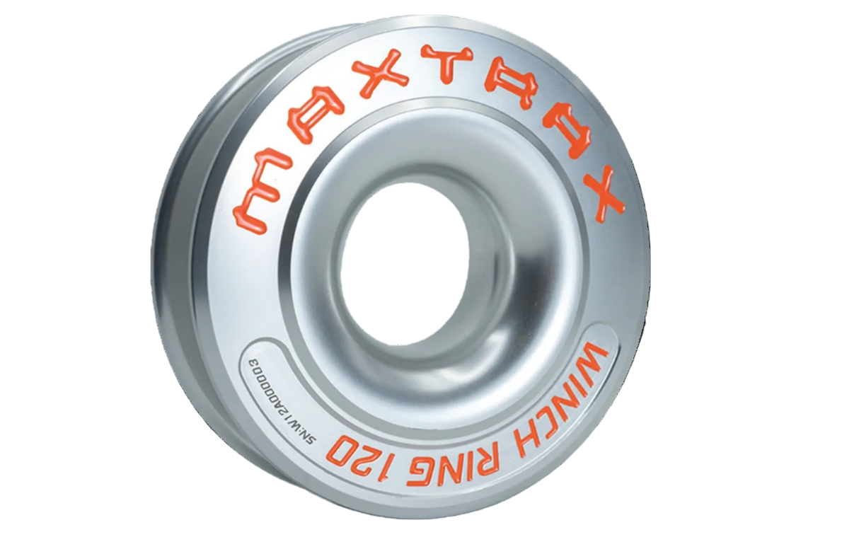 A silver MAXTRAX Winch Ring 120, made from polished and brushed aluminum with an anodized finish. It is displayed alongside a core shackle which is marked as a bonus.