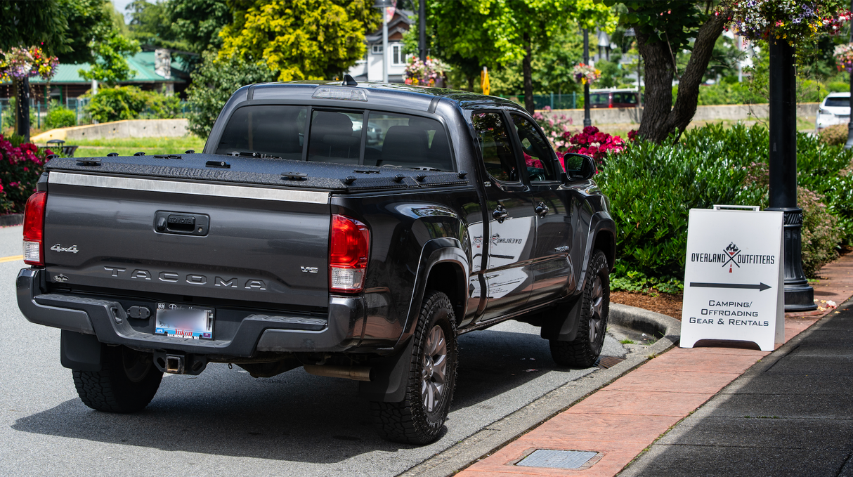 Diamondback Tonneau Cover on a black Toyota Tacoma in Cloverdale