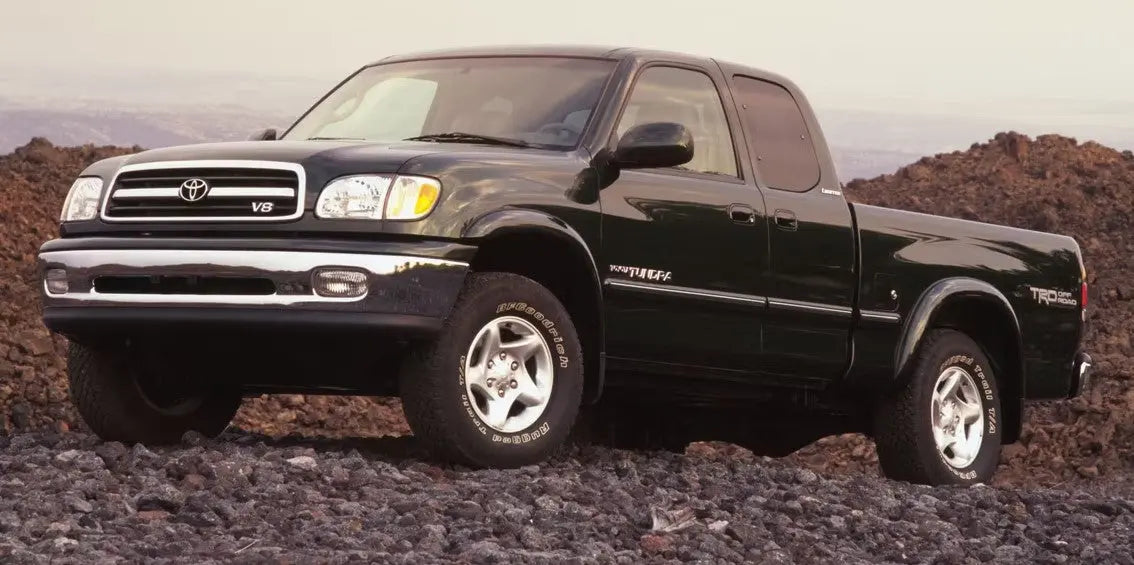 Side view of a white 2005 1st gen Toyota Tundra
