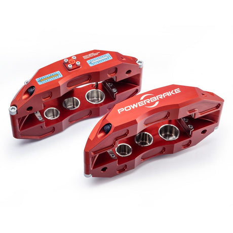 A set of red PowerBrake 6-piston calipers with cooling vanes and billet mounting brackets, intended for 4x4 vehicles.