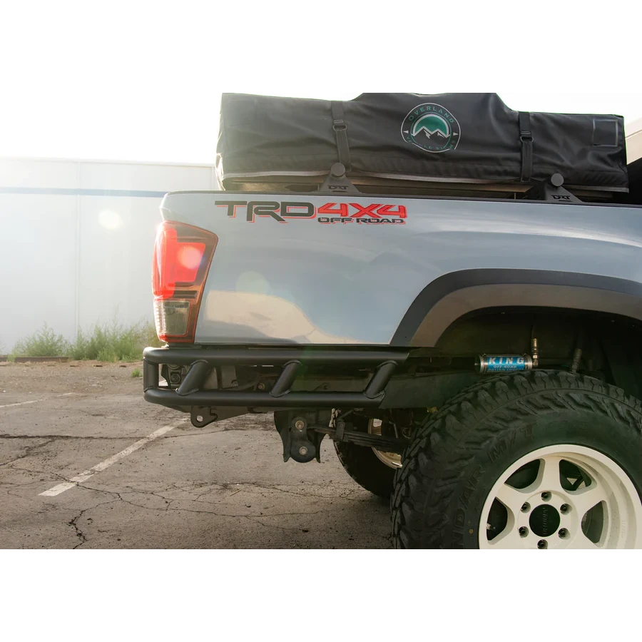 Back of a truck with 'TRD 4x4 Off Road' branding and a black cargo bag.