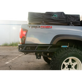 Back of a truck with 'TRD 4x4 Off Road' branding and a black cargo bag.