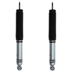 Two shock absorbers with 'Bilstein' branding on a white background