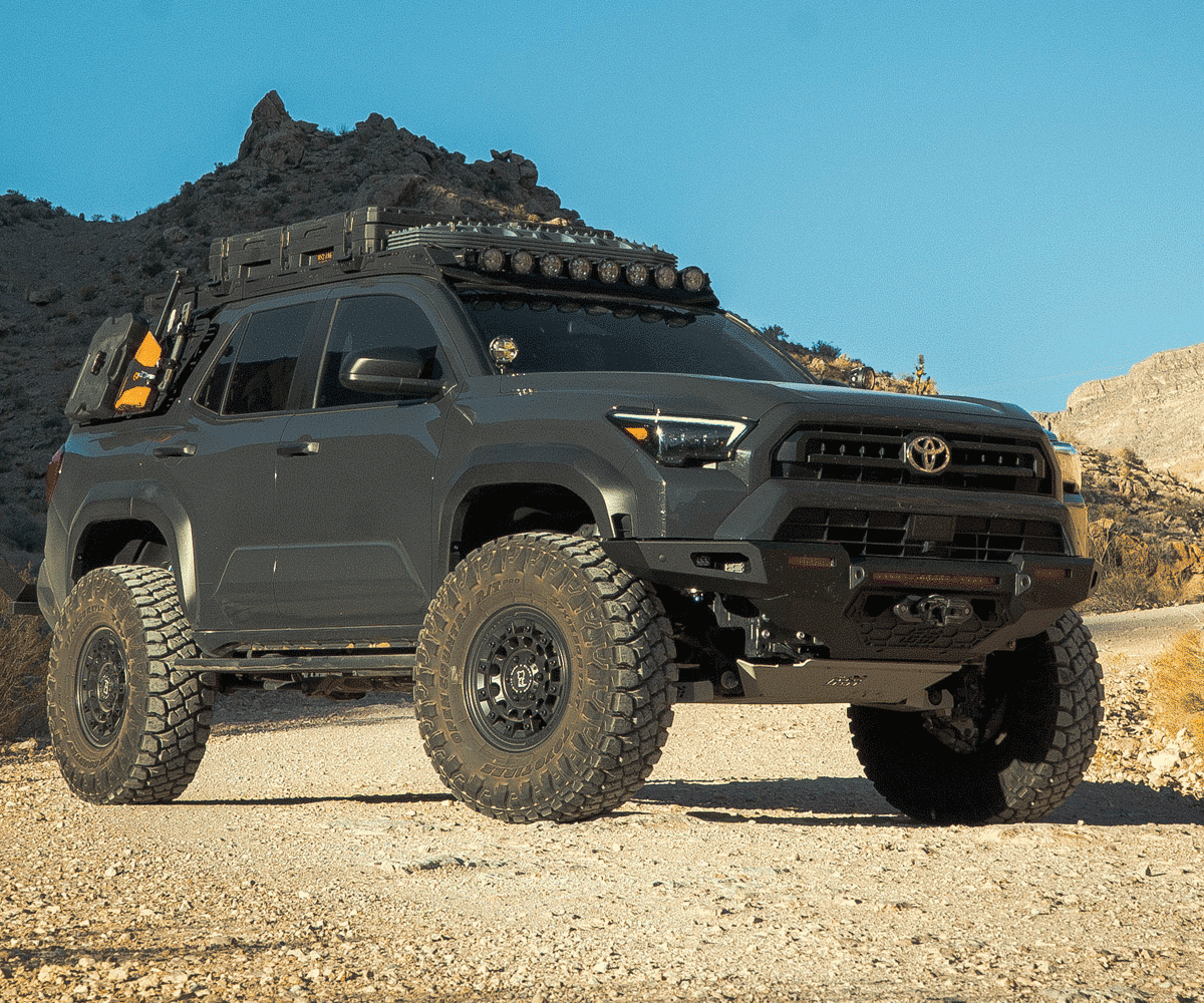 Toyota SUV with off-road equipment in a desert landscape
