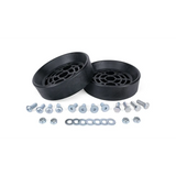 Two black rubber gaskets with screws and washers on a white background