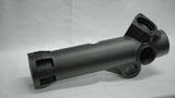 Black metal mechanical component on a gray background