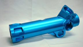 Blue metal cylindrical component on a light gray background