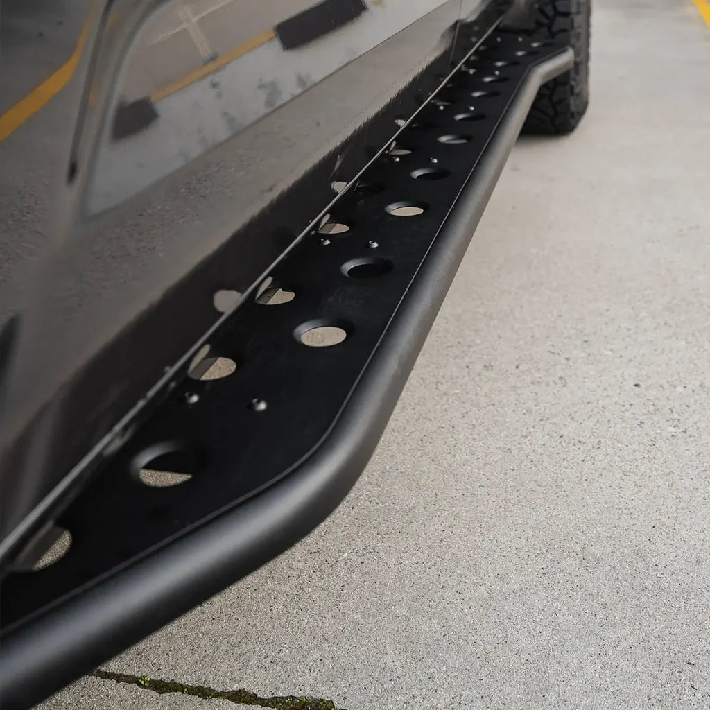 Close-up of a black slider on a concrete surface