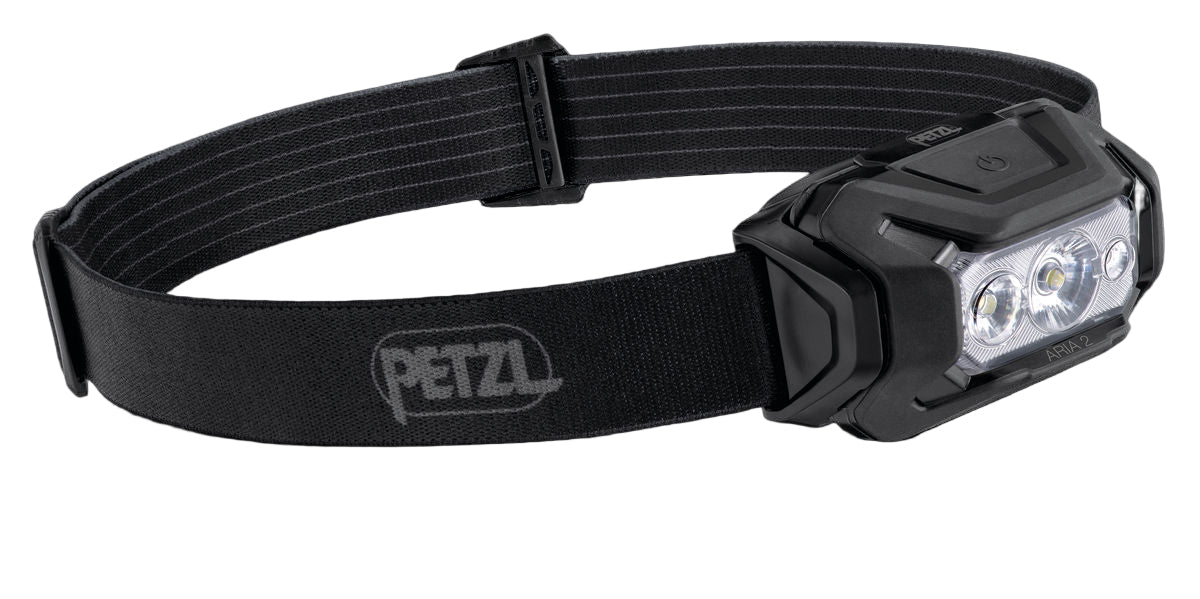 Black headlamp with Petzl logo on a white background