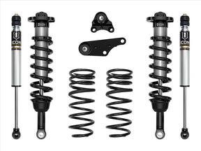 Set of suspension components including shock absorbers and springs on a white background