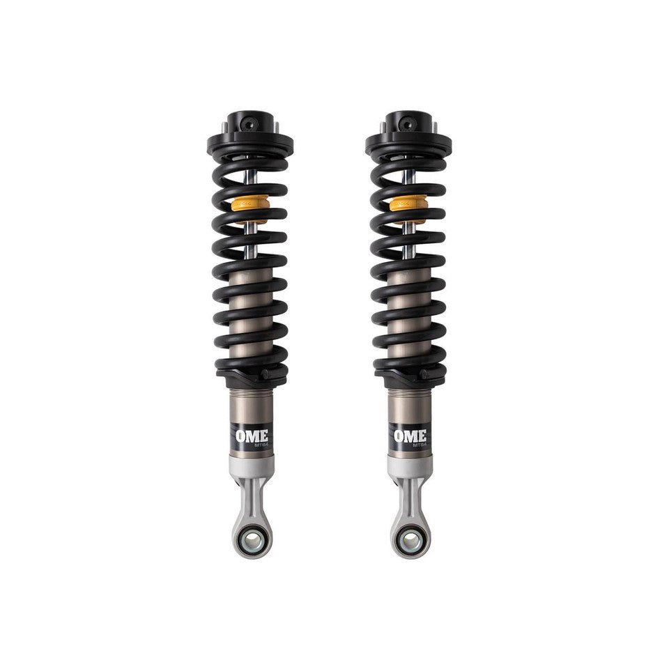 Black, silver and yellow coilovers on a white background