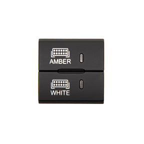 Black electronic switch with 'Amber' and 'White' labels on a white background