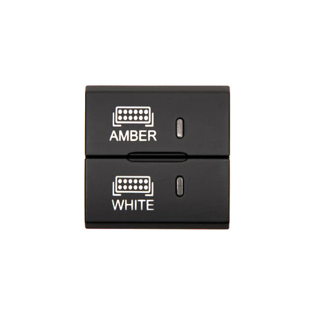 Black electronic switch with 'Amber' and 'White' labels on a white background