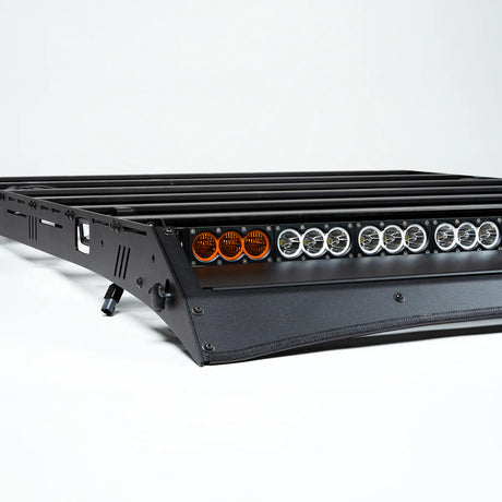 LED light bar mounted to roof rack with multiple lights on a white background
