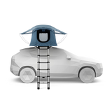Car with a rooftop tent and ladder on a white background