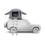 Car with a rooftop tent and ladder on a transparent background