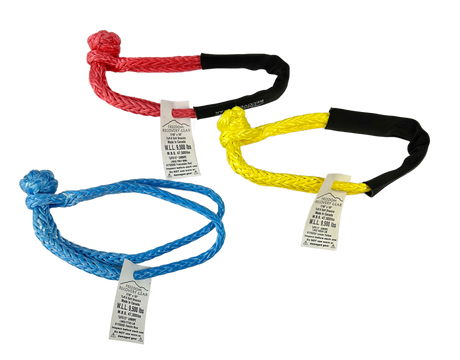 Set of three soft rope shackles in red, blue, and yellow with tags on a white background