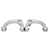 Two metal suspension control arms on a white background