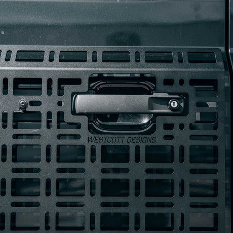 Black storage bin with a handle and 'Westcott Designs' branding.