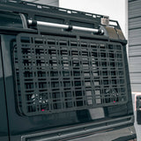 Black vehicle cargo basket on a car with a blurred background