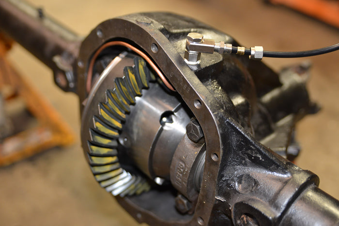 Close-up of a mechanical air locker gear system with a blurred background