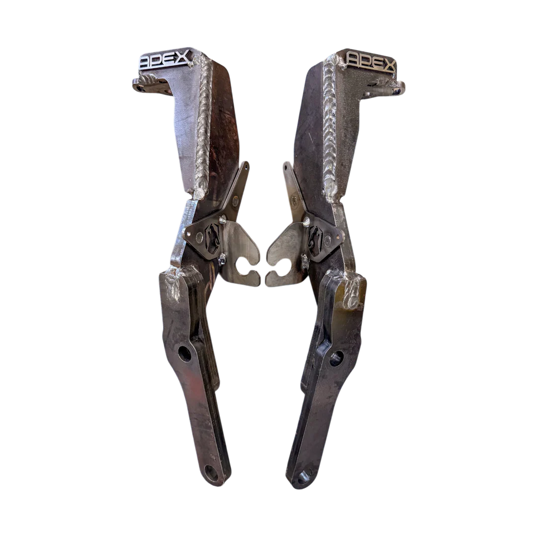 Pair of Apex spindle gussets on a white background