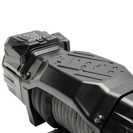 Close-up of a black mechanical component on a white background