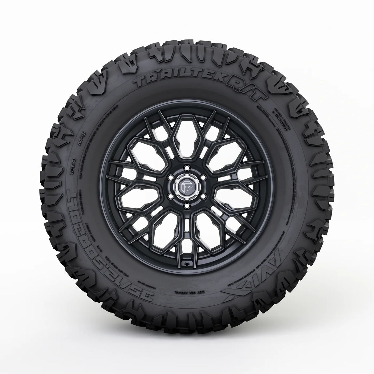 Black tire with a detailed tread pattern on a white background