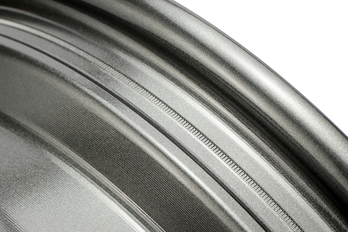 Close-up of a metallic surface with reflective properties