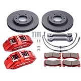 Brake system components including rotors, calipers, and pads on a white background
