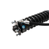 Shock absorber with visible branding on a white background