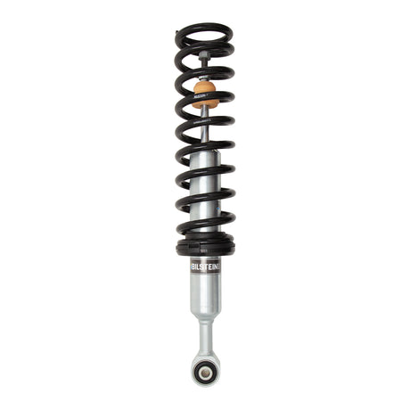 Shock absorber with coil spring on a white background