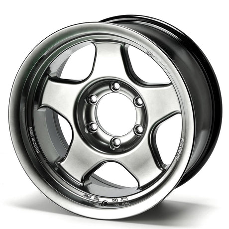 Chrome car wheel rim on a white background