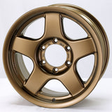 Bronze alloy wheel on a white background