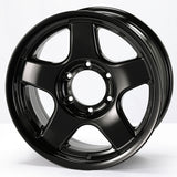 Black alloy wheel on a white background
