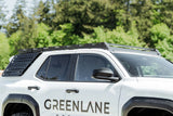 Side view of SUV with roof rack