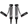 Two shock absorbers with springs on a white background