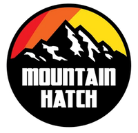 Mountain Hatch logo with mountains, sun, and text on a black background