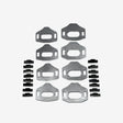 Set of metal brackets and fasteners on a gray background
