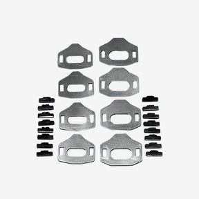 Set of metal brackets and fasteners on a gray background