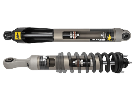 Two shock absorbers on a white background